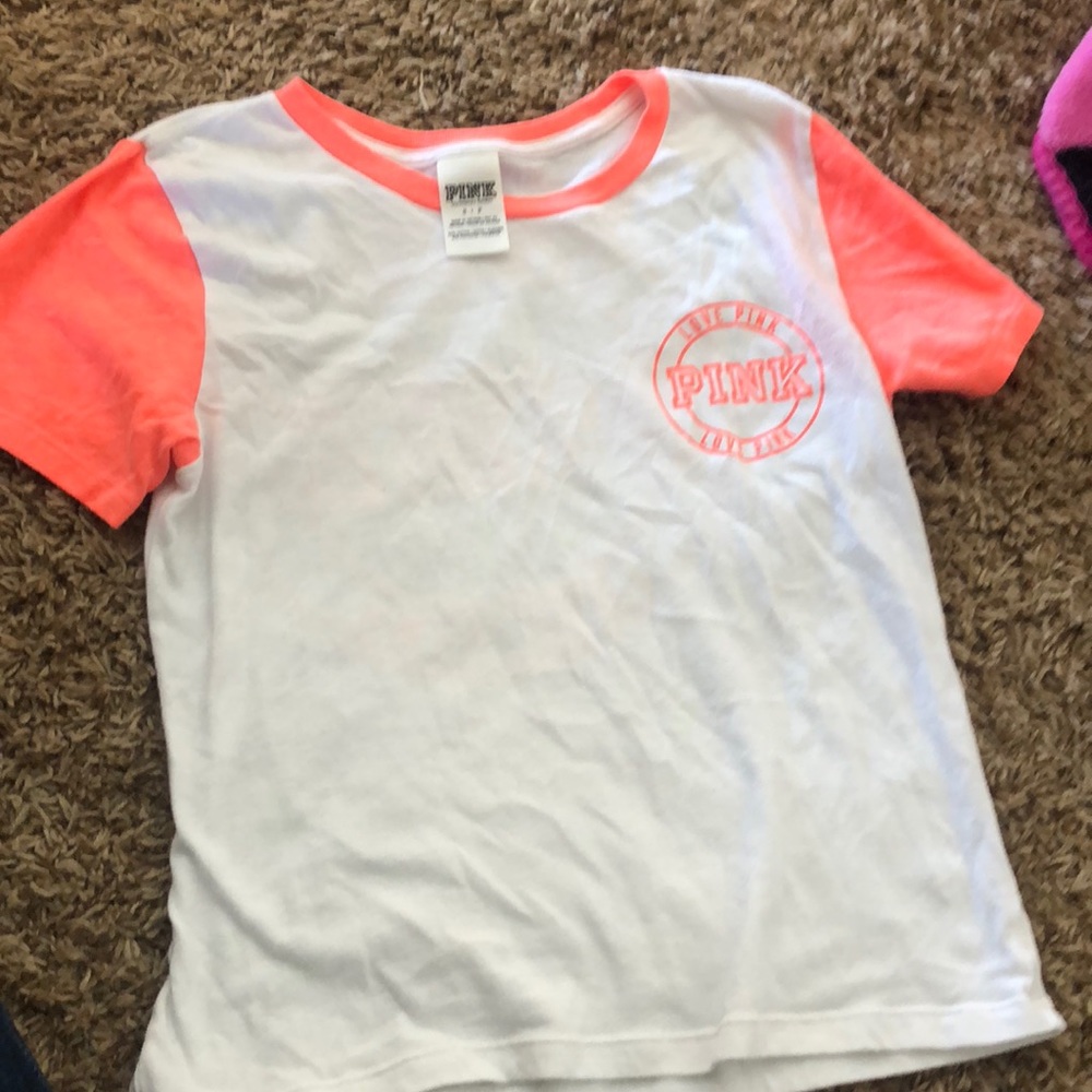 Pink size small tee. No rips or stains.